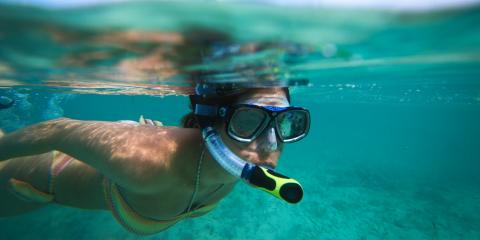 Woman scuba diving in Belize
